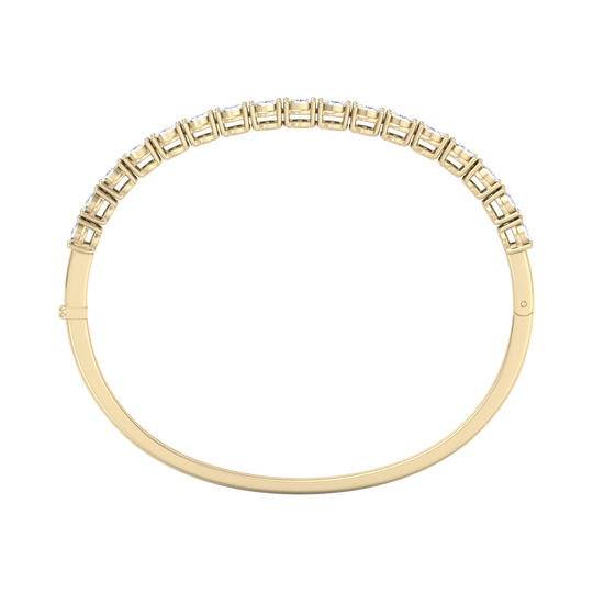 Bangle with miracle plates in yellow gold with white diamonds of 1.53 ct in weight