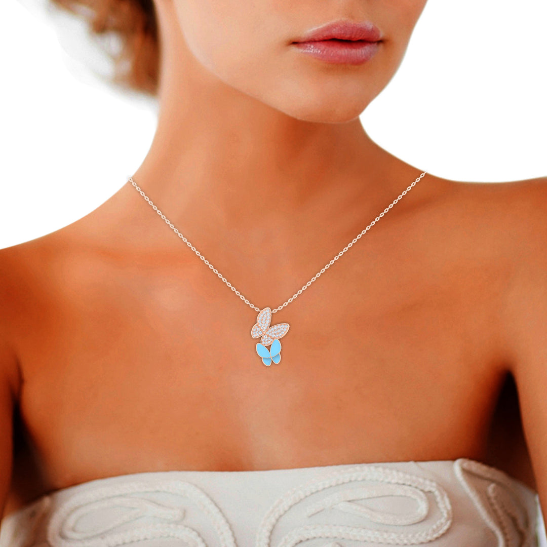18K gold women's pendant with pastel blue enamel VS diamonds 0.20 ct. in weight