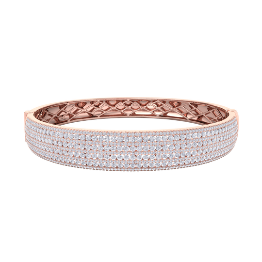 Diamond bangle in yellow gold with white diamonds of 6.97 ct in weight