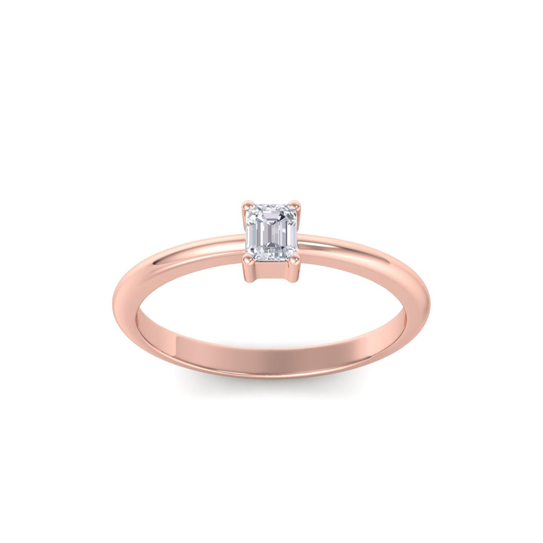 Emerald shaped petite diamond ring in rose gold with white diamonds of 0.25 in weight