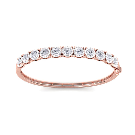 Bangle in yellow gold with white diamonds of 3.30 ct in weight with miracle plate setting