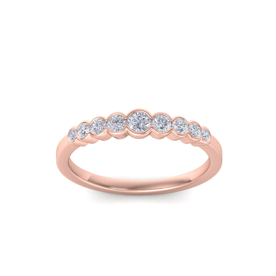 Wedding band in rose gold with white diamonds of 0.34 ct in weight