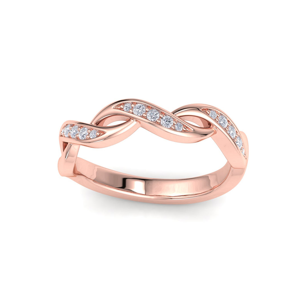 Twisted ring in rose gold with white diamonds of 0.15 ct in weight