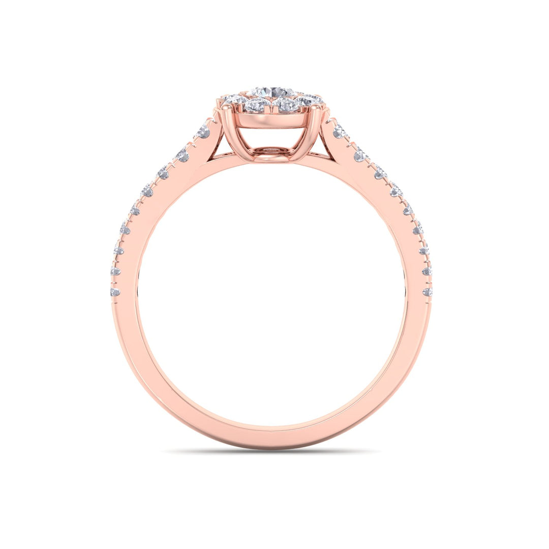 Halo engagement ring with pavé band in rose gold with white diamonds of 0.56 ct in weight