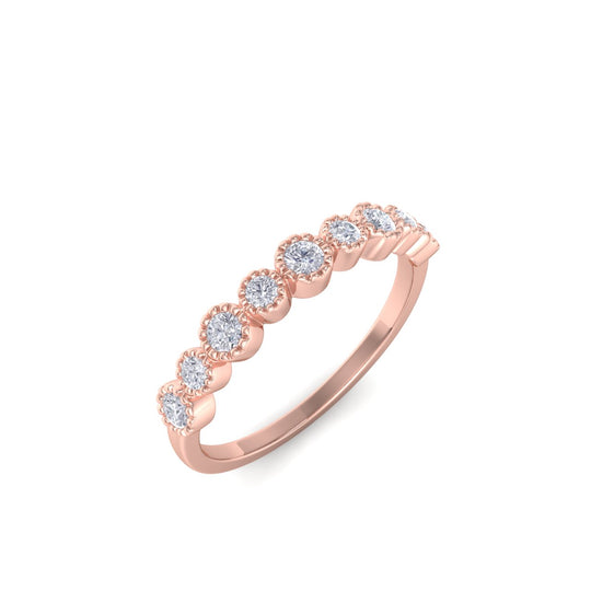 Milgrain wedding band in rose gold with white diamonds of 0.25 ct in weight