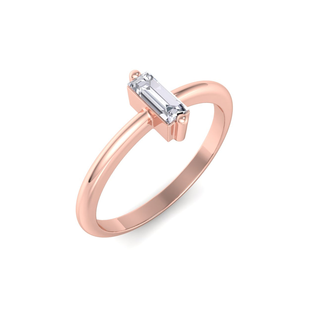 Baguette shaped petite diamond ring in rose gold with white diamonds of 0.25 ct in weight