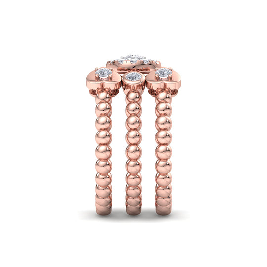 Triple band ring in rose gold with white diamonds of 0.55 ct in weight