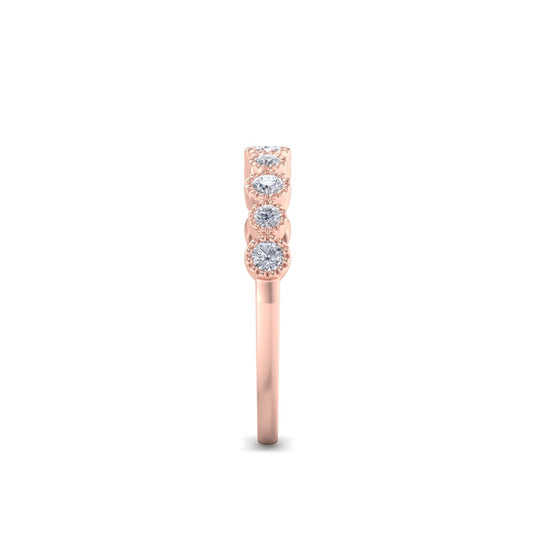 Milgrain wedding band in rose gold with white diamonds of 0.25 ct in weight