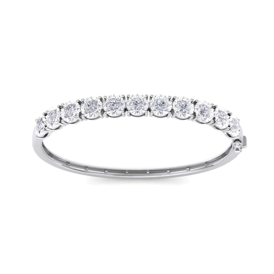 Bangle in white gold with white diamonds of 3.30 ct in weight with miracle plate setting