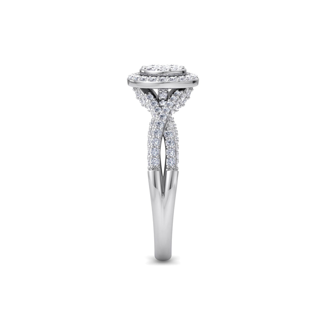 Round cluster engagement ring in white gold with petite white diamonds of 0.76 ct in weight