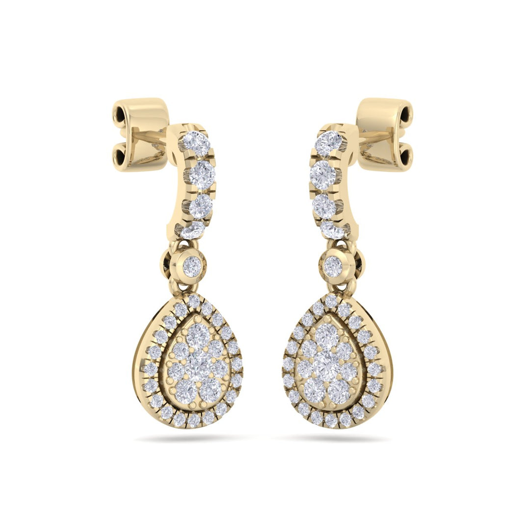Pear drop earrings in yellow gold with white diamonds in 0.79 ct in weight