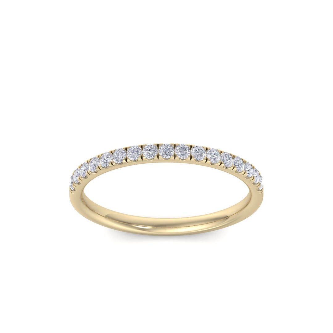 Pavé half eternity band in yellow gold with white diamonds of 0.24 ct in weight