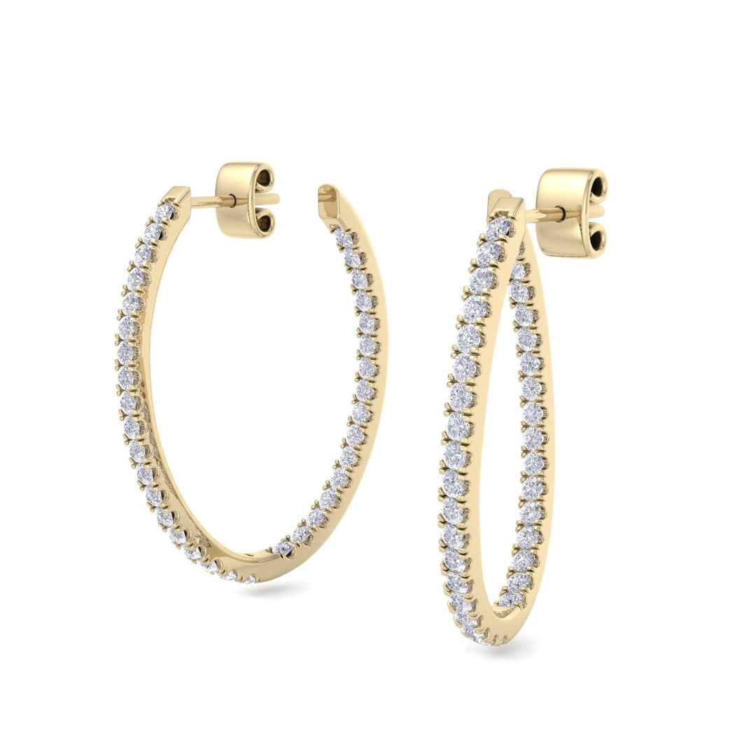 Hoop drop earrings in white gold with white diamonds of 0.90 ct in weight