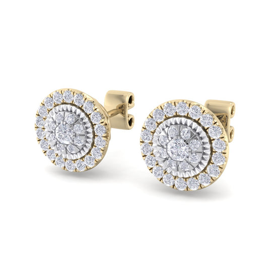 Round stud earrings in yellow gold with white diamonds of 0.55 ct in weight