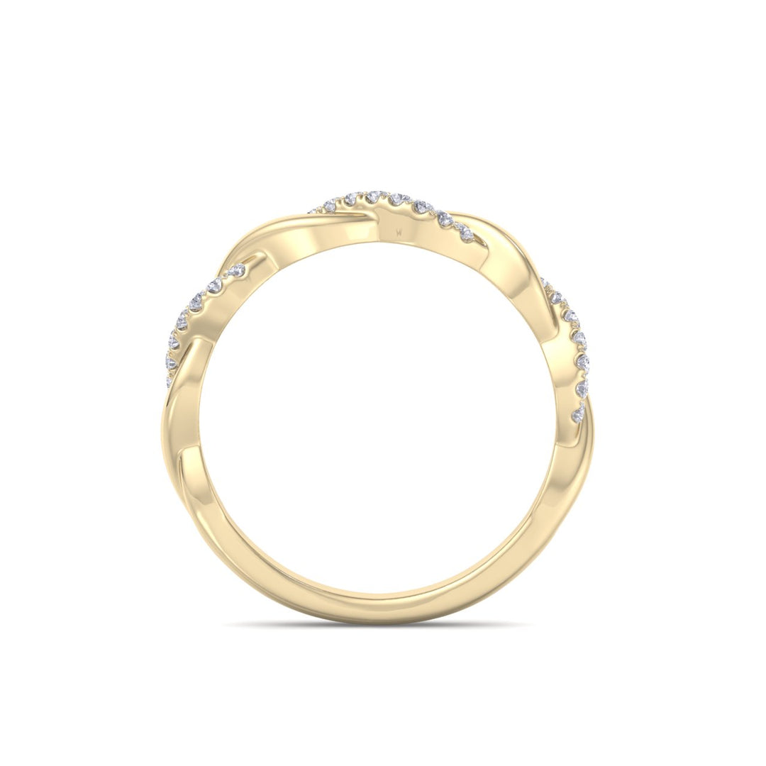 Twisted ring in yellow gold with white diamonds of 0.25 ct in weight