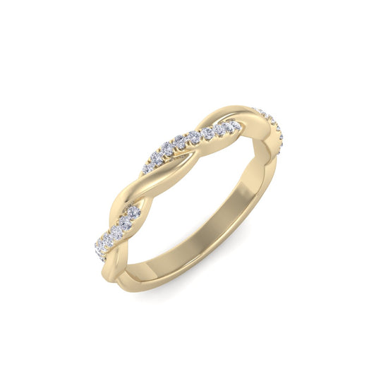 Twisted ring in yellow gold with white diamonds of 0.25 ct in weight