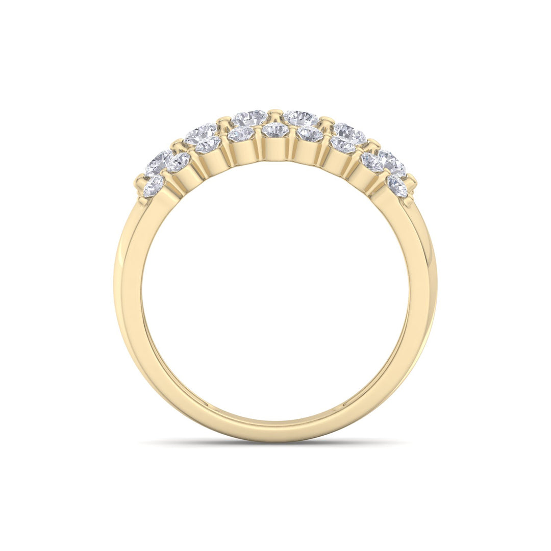 Three row ring in yellow gold with white diamonds of 0.81 ct in weight