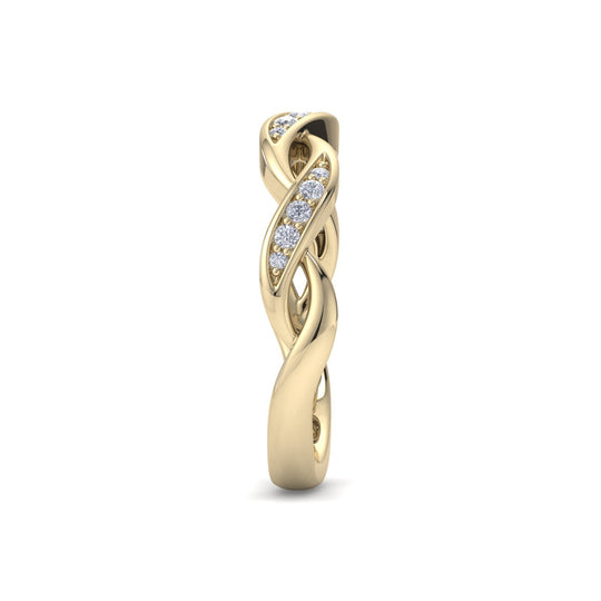Twisted ring in yellow gold with white diamonds of 0.15 ct in weight