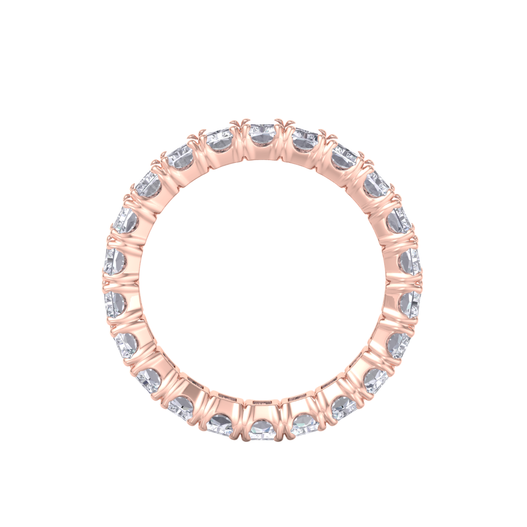 Eternity ring in yellow gold with emeralds white diamonds of 4.18 ct in weight 
